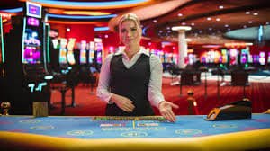 Antarmuka permainan Aviator dan Sweet Bonanza di platform axibet dengan papan peringkat turnamen real-time